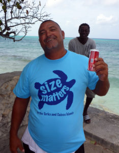 A local fisherman proudly shows off his Size Matters tshirt