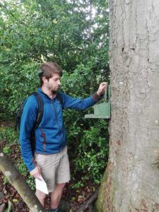 George-Porton-checking-squirrel-feeding-station