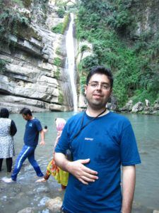 Saeed at a waterfall