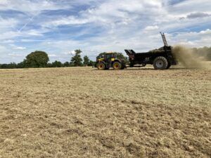 Spreading – The cut green hay was spread using a muck spreader.